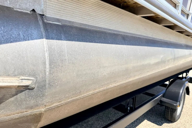Slide: The Image of Close-up of a 2013 South Bay 417 CR pontoon boat on a trailer. - 80