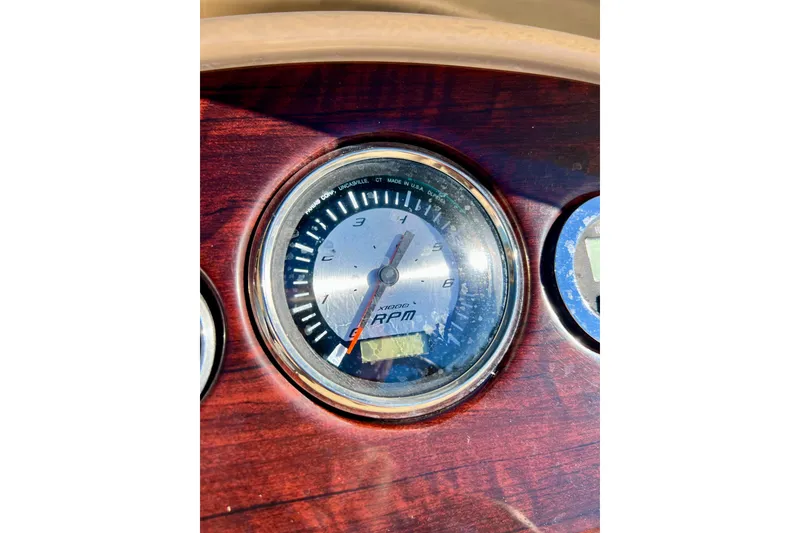 Slide: The Image of Tachometer on 2013 South Bay 417 CR boat dashboard, displaying RPM readings. - 46