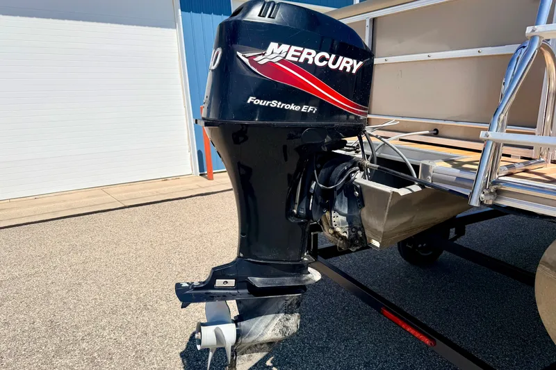 Slide: The Image of 2013 South Bay 417 CR boat with Mercury FourStroke EFI outboard motor. - 14