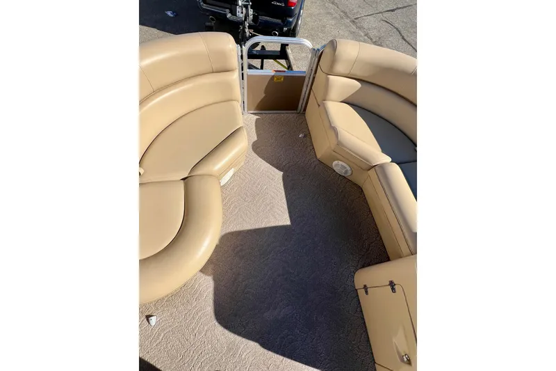 Slide: The Image of 2013 South Bay 417 CR boat interior with beige seating and carpet flooring. - 41
