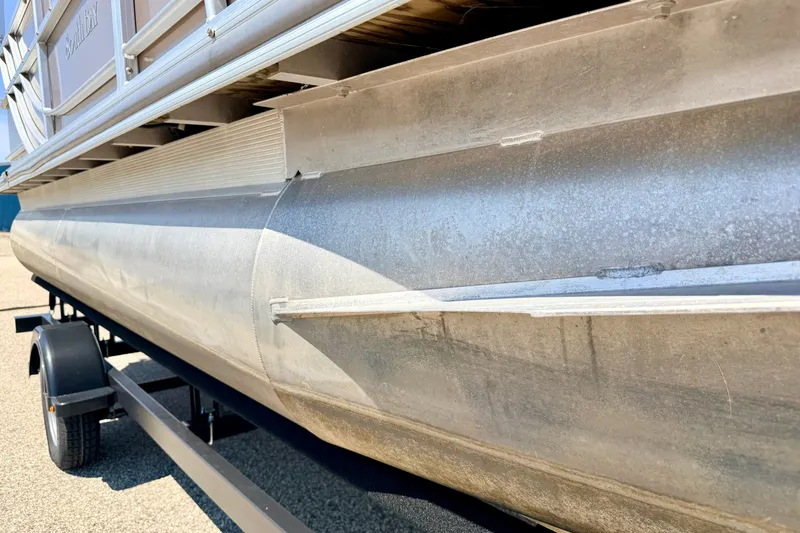 Slide: The Image of 2013 South Bay 417 CR pontoon boat on trailer, close-up view of aluminum hull. - 19