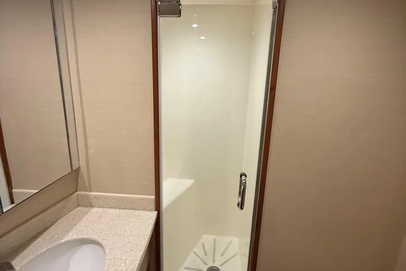 Slide: The Image of Bathroom interior of 2013 Hatteras GT54 yacht with shower and sink. - 18