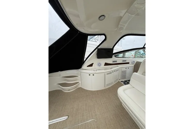 Slide: The Image of Interior of 2003 Sea Ray 550 Sundancer yacht with sleek design and modern amenities. - 12