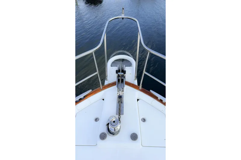 Slide: The Image of Bow view of 2006 Beneteau Swift Trawler 42, featuring anchor and railing. - 33