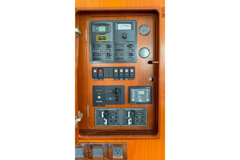 Slide: The Image of Electrical control panel on a 2006 Beneteau Swift Trawler 42 yacht. - 34