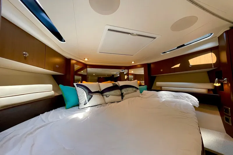 Slide: The Image of Luxurious interior cabin of 2015 Sea Ray Sundancer 350 yacht with plush bedding. - 26