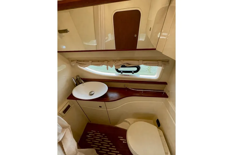 Slide: The Image of Luxurious bathroom interior of 2015 Sea Ray Sundancer 350 yacht with modern fixtures. - 27