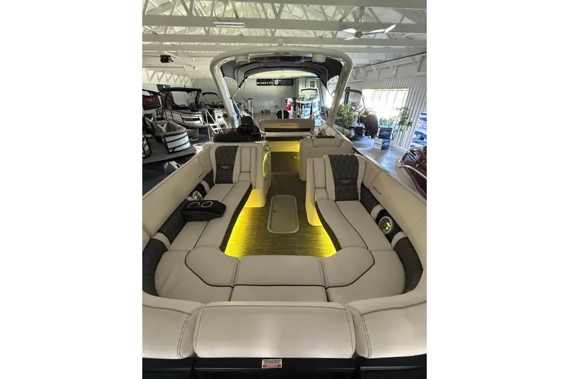 Slide: The Image of Luxurious interior of a 2021 Bennington Q 25 QSBA pontoon boat with ambient lighting. - 9