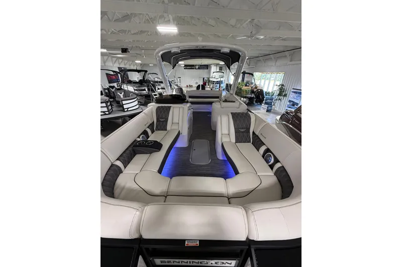 Slide: The Image of Luxurious interior of 2021 Bennington Q 25 QSBA pontoon boat with ambient lighting. - 2