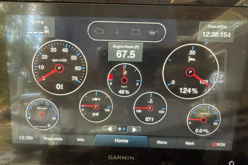 Slide: The Image of Dashboard display of a 2022 Sportsman Masters 227 Bay Boat with engine metrics. - 21