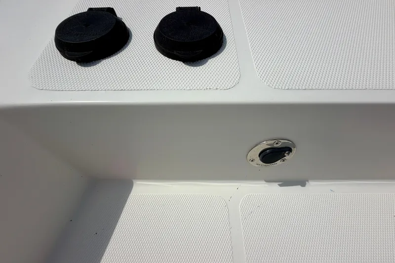 Slide: The Image of Deck fittings on a 2016 Nordic Tug 44 boat, featuring textured surfaces and hardware. - 12