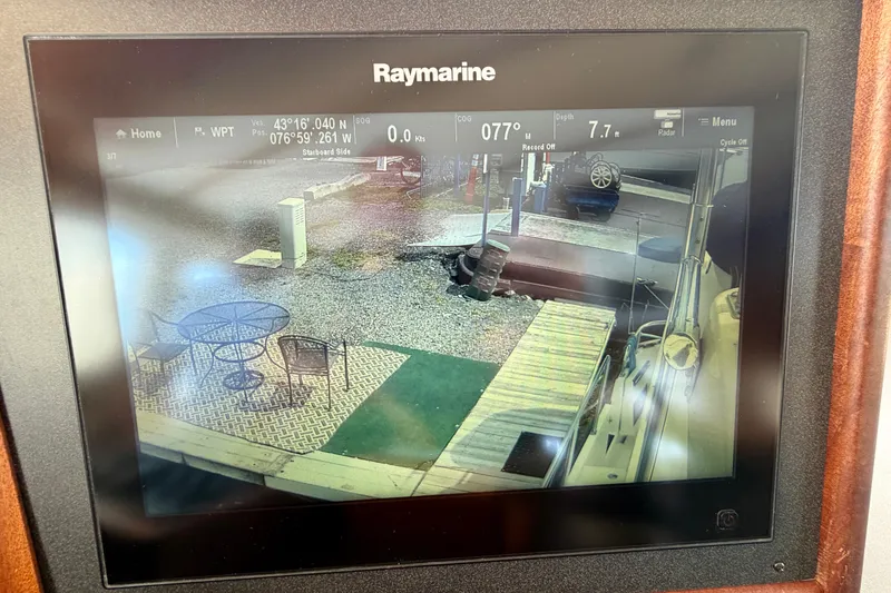 Slide: The Image of Raymarine display on 2016 Nordic Tug 44 showing dockside view and navigation data. - 62