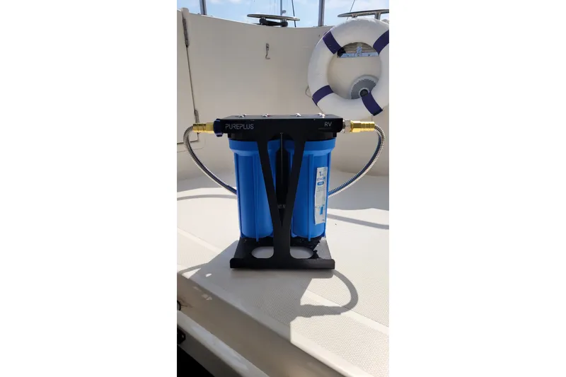 Slide: The Image of Water filtration system on 2016 Nordic Tug 44 boat deck with life preserver. - 118