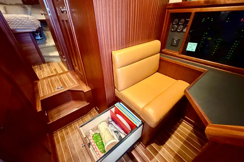 Slide: The Image of Cozy interior of 2016 Nordic Tug 44 with seating and storage drawer. - 68