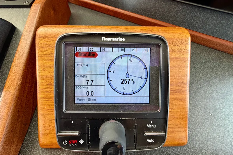 Slide: The Image of Raymarine navigation display on 2016 Nordic Tug 44, showing compass and depth readings. - 63