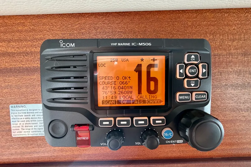 Slide: The Image of VHF marine radio IC-M506 on 2016 Nordic Tug 44, displaying channel 16 and navigation data. - 55