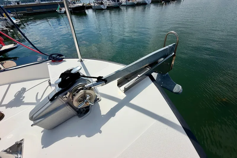 Slide: The Image of Nordic Tug 44 (2016) anchor system on deck, docked at marina. - 9