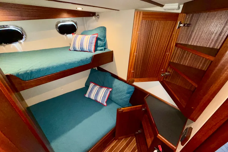 Slide: The Image of Cozy cabin with bunk beds in 2016 Nordic Tug 44 yacht interior. - 74