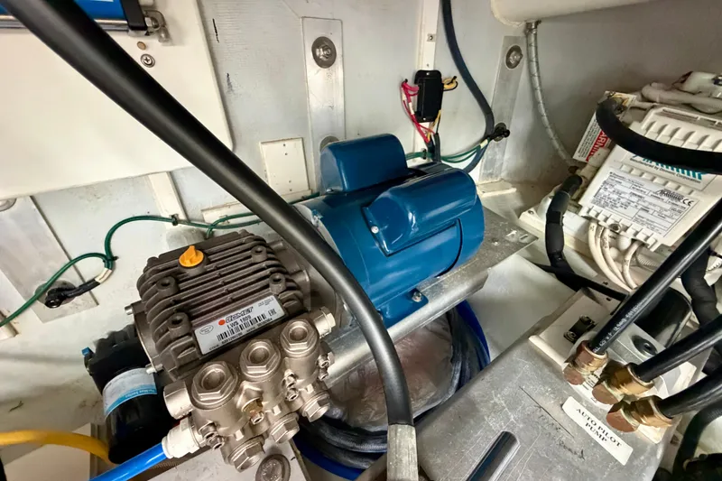 Slide: The Image of Engine room of 2016 Nordic Tug 44 with mechanical components and wiring. - 108