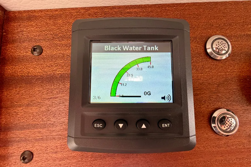 Slide: The Image of Black water tank gauge on 2016 Nordic Tug 44 boat dashboard. - 57