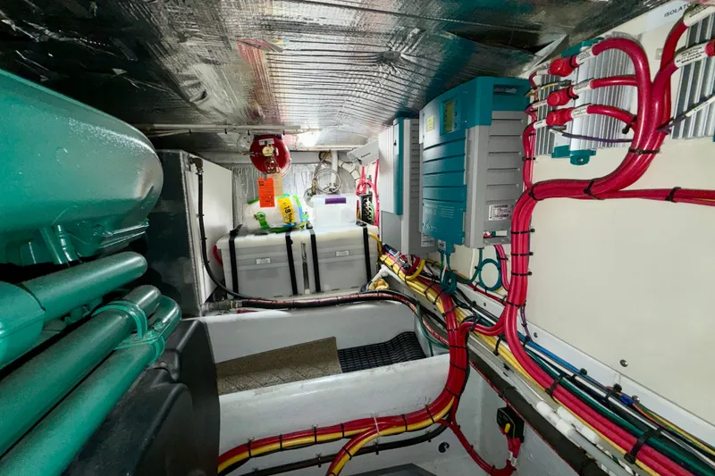 Slide: The Image of Engine room of 2016 Nordic Tug 44 with organized wiring and equipment. - 88