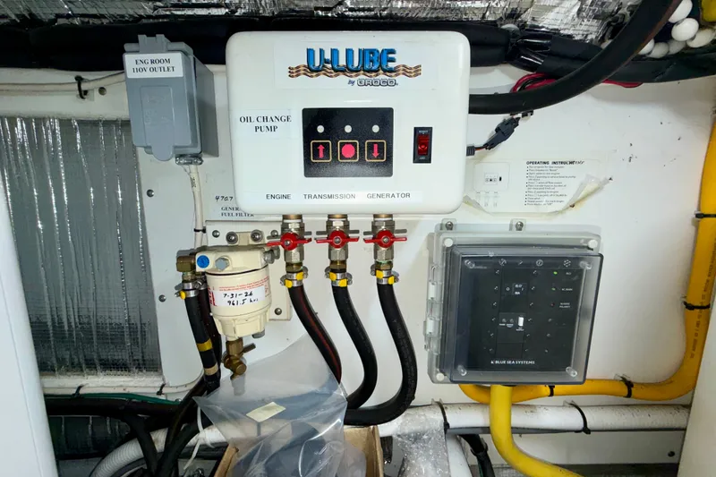 Slide: The Image of Engine room of 2016 Nordic Tug 44 with oil change pump system. - 95