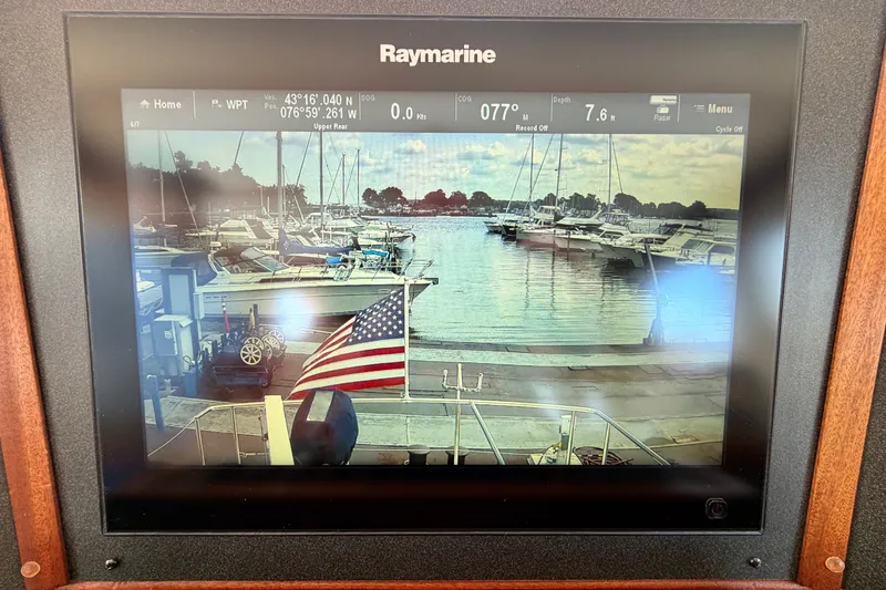 Slide: The Image of Raymarine display on 2016 Nordic Tug 44 showing marina view with American flag. - 60