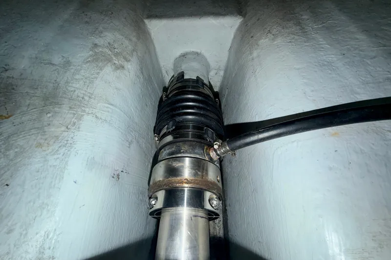 Slide: The Image of Engine compartment detail of a 2016 Nordic Tug 44 boat, showing mechanical components. - 101