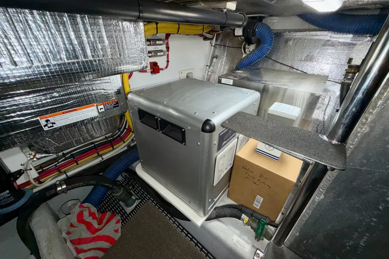 Slide: The Image of Engine room of a 2016 Nordic Tug 44 with insulated walls and equipment. - 89