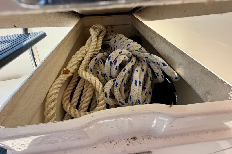 Slide: The Image of Storage compartment with ropes on a 2016 Nordic Tug 44 boat. - 17