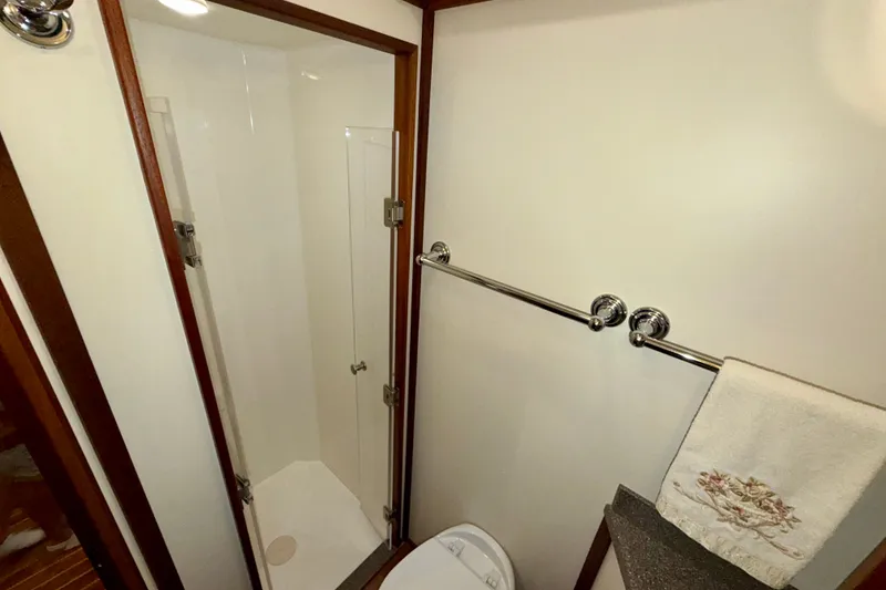 Slide: The Image of Bathroom interior of 2016 Nordic Tug 44 with shower and towel rack. - 84