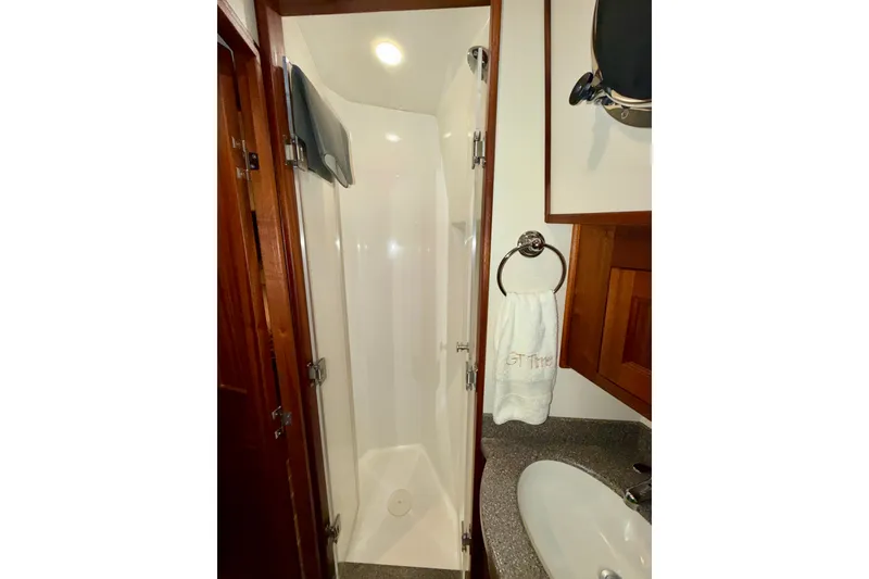 Slide: The Image of Bathroom interior of 2016 Nordic Tug 44 with shower and sink. - 79