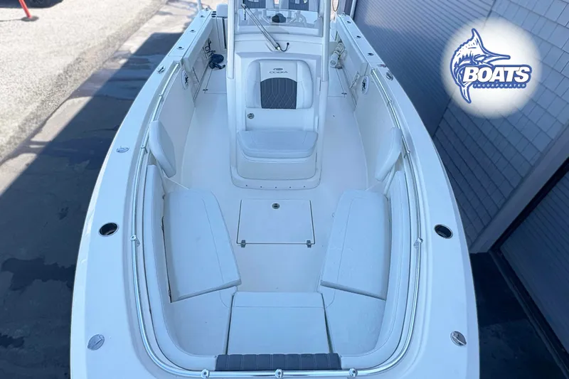 Slide: The Image of 2023 Cobia 262 Center Console boat interior with seating and storage compartments. - 4