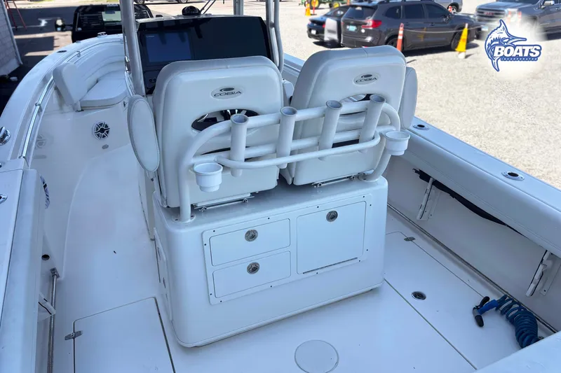 Slide: The Image of 2023 Cobia 262 Center Console boat interior with seating and storage compartments. - 10