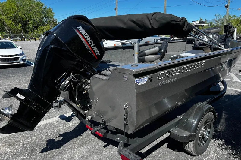 Slide: The Image of 2023 Crestliner 1600 Vision boat with Mercury outboard motor on trailer. - 5