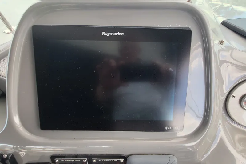 Slide: The Image of Raymarine display on 2006 Cruisers Yachts 370 Express dashboard. - 14