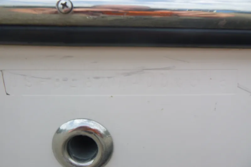 Slide: The Image of Close-up of a 2016 Bayliner 175 Bowrider hull identification number area. - 15