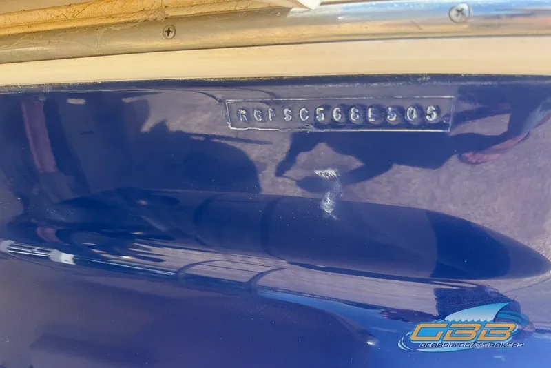 Slide: The Image of 2005 Monterey 228SI Montura Bowrider hull with identification number, Georgia Boat Brokers logo. - 26