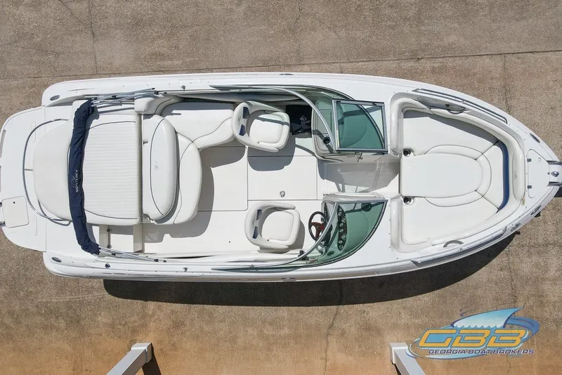 Slide: The Image of 2005 Monterey 228SI Montura Bowrider, aerial view, showcasing seating and layout. - 5