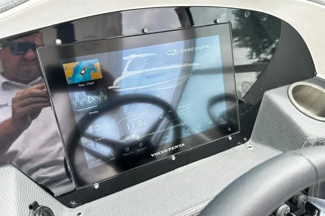 Slide: The Image of Dashboard of a 2027 Regal 3300 boat featuring a Volvo Penta touchscreen display. - 14