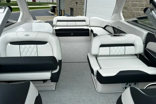 Slide: The Image of Luxurious 2027 Regal 3300 boat interior with elegant white and black seating. - 34