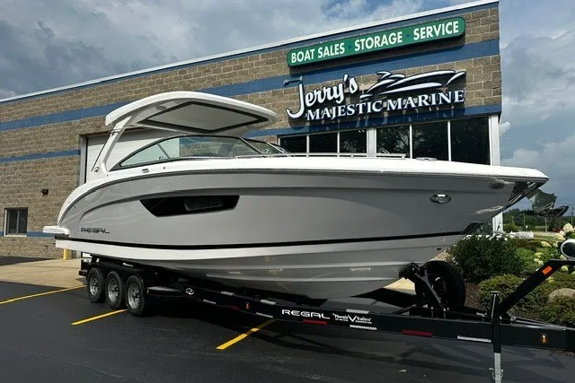 The Image of 2027 Regal 3300 boat on trailer at Jerry's Majestic Marine dealership. - 0