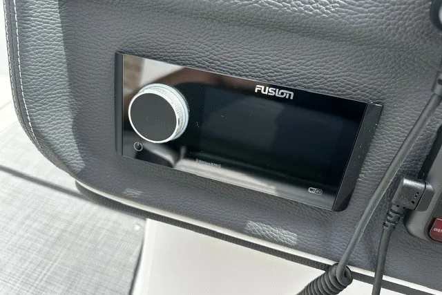 Slide: The Image of Fusion audio system in 2027 Regal 3300 boat dashboard. - 16