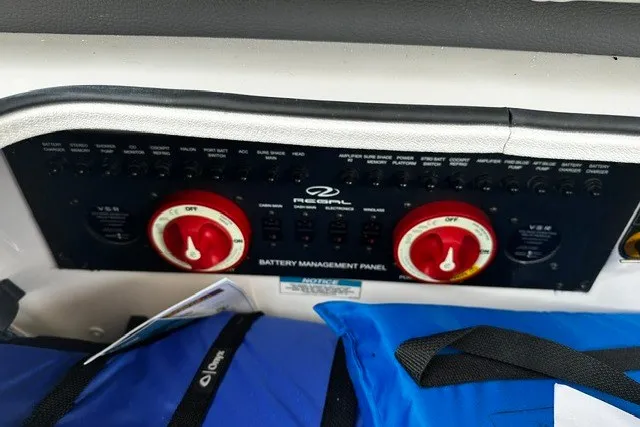 Slide: The Image of Battery management panel of 2027 Regal 3300 boat with control switches and indicators. - 24