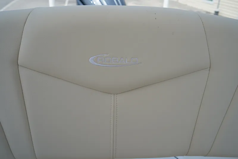 Slide: The Image of Beige seat with Robalo logo on 2027 Robalo 226 Cayman boat. - 14