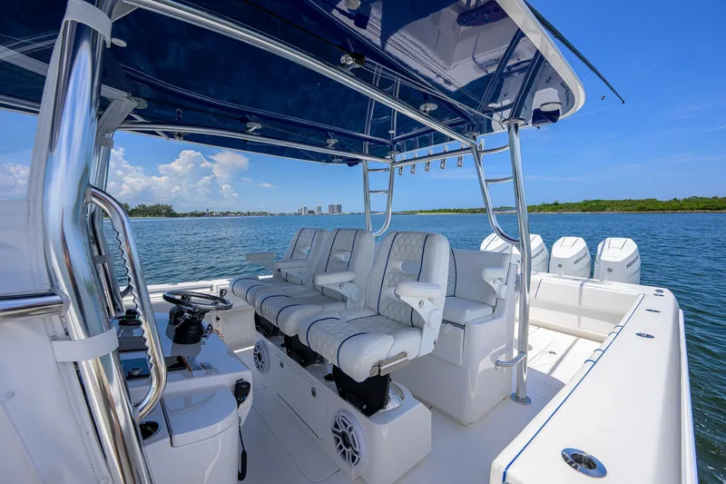 Slide: The Image of 2023 Contender 44 ST boat interior with luxurious seating and ocean view. - 37