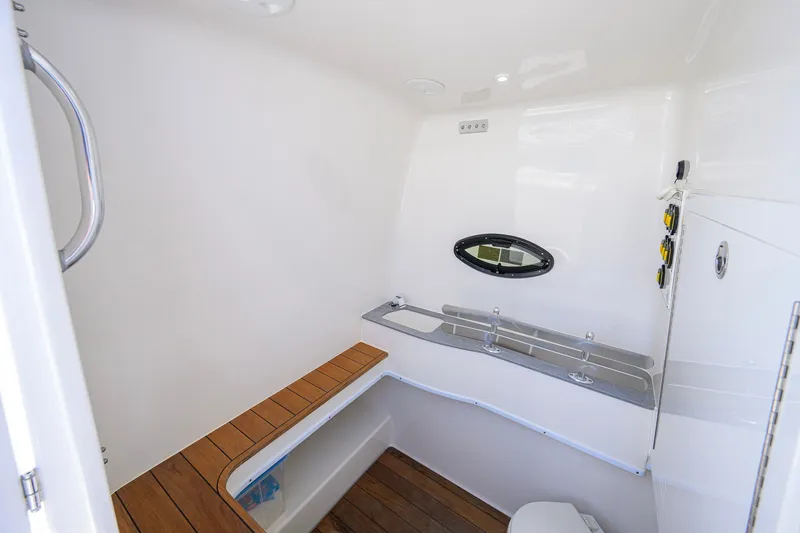Slide: The Image of 2023 Contender 44 ST boat interior with sleek design and wooden accents. - 62