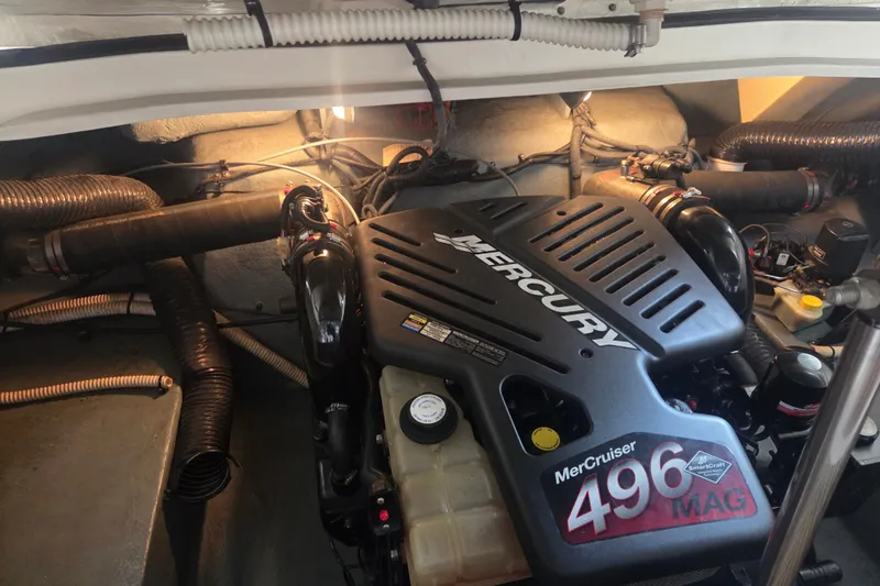 Slide: The Image of Engine compartment of a 2001 Sea Ray 290 Bow Rider with a Mercury MerCruiser 496 MAG engine. - 20