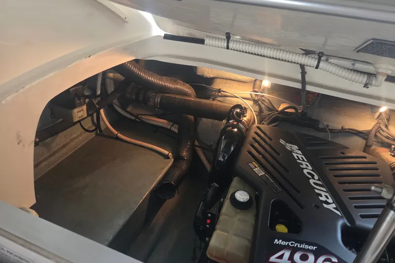 Slide: The Image of Engine compartment of a 2001 Sea Ray 290 Bow Rider with MerCruiser 496 engine. - 22