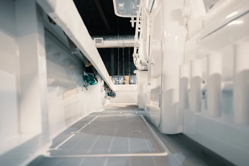 Slide: The Image of Interior view of a 2023 Freeman 42LR boat, showcasing sleek design and equipment. - 90